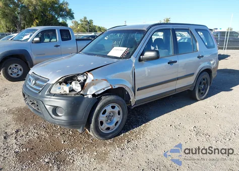 2006 Honda Cr-V Lx z USA, uszkodzony, nr VIN JHLRD78506C057314